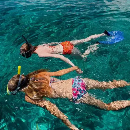 Snorkelling adventure at Vakkaru Maldives exploring vibrant coral reefs and marine life.