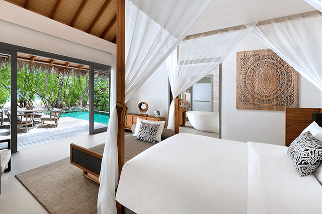 Deluxe Beach Pool Retreat bedroom overlooking the beach