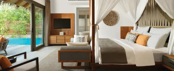 Bedroom of beach pool residence at Vakkaru Maldives with private pool access