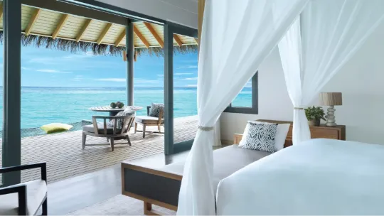Overwater villa at Vakkaru Maldives with private deck and lagoon views.