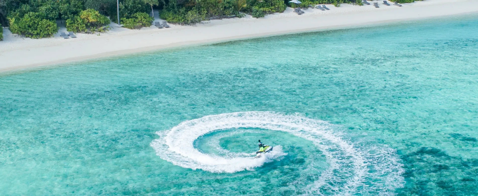 Watersports at Vakkaru Maldives with jet ski, sailing and parasailing