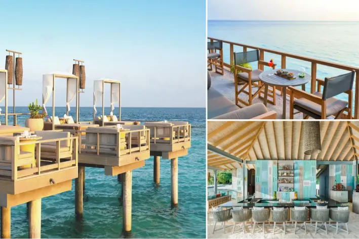 Overwater Lagoon Bar at Vakkaru Maldives with ocean views, lounge seating, and sunset setting over the turquoise lagoon.