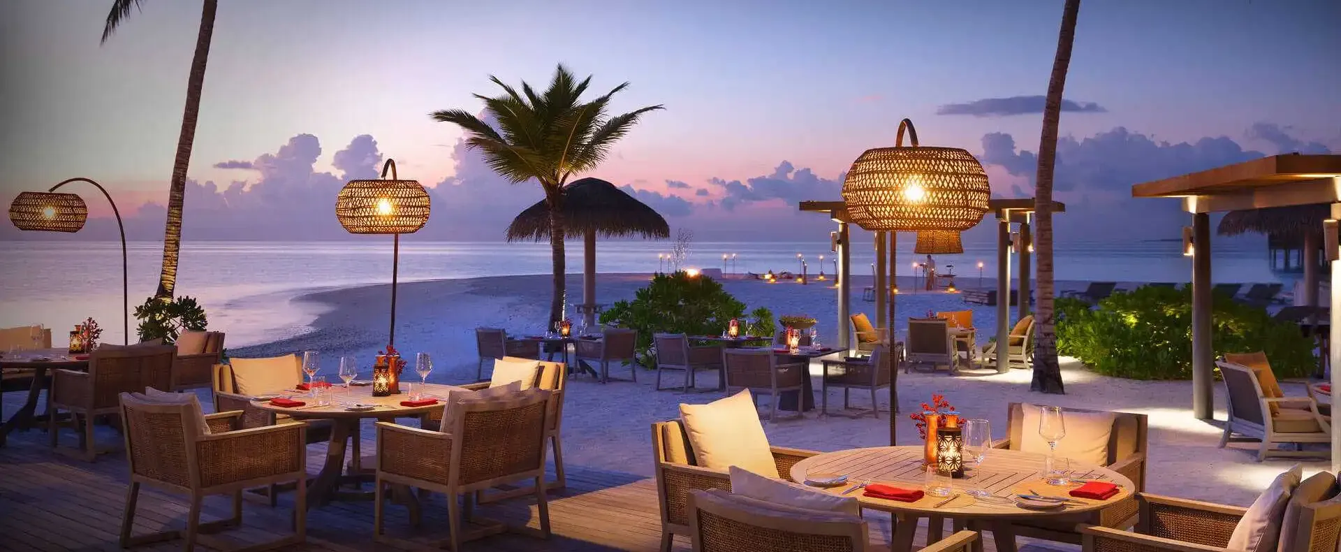 Vakku beach grill at Vakkaru Maldives Residence serving premium meats and fresh seafood cooked over flame in an open-air seaside setting.