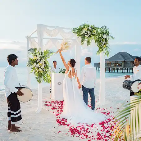 Elegant wedding celebration at Vakkaru Maldives Residence featuring a romantic beachfront setting with stunning ocean views.