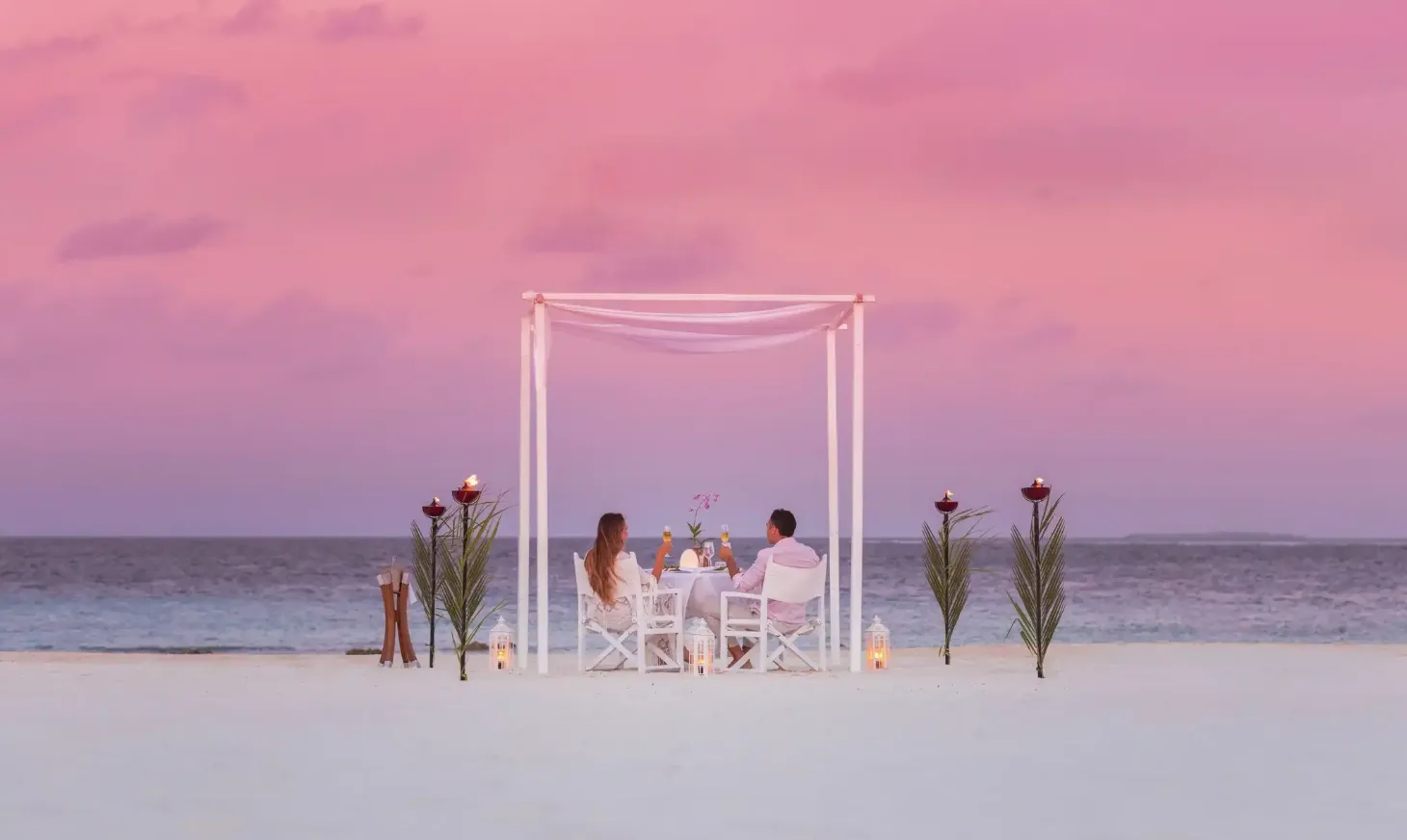 Private destination beach dining experience at Vakkaru Maldives with a romantic setup for a couple