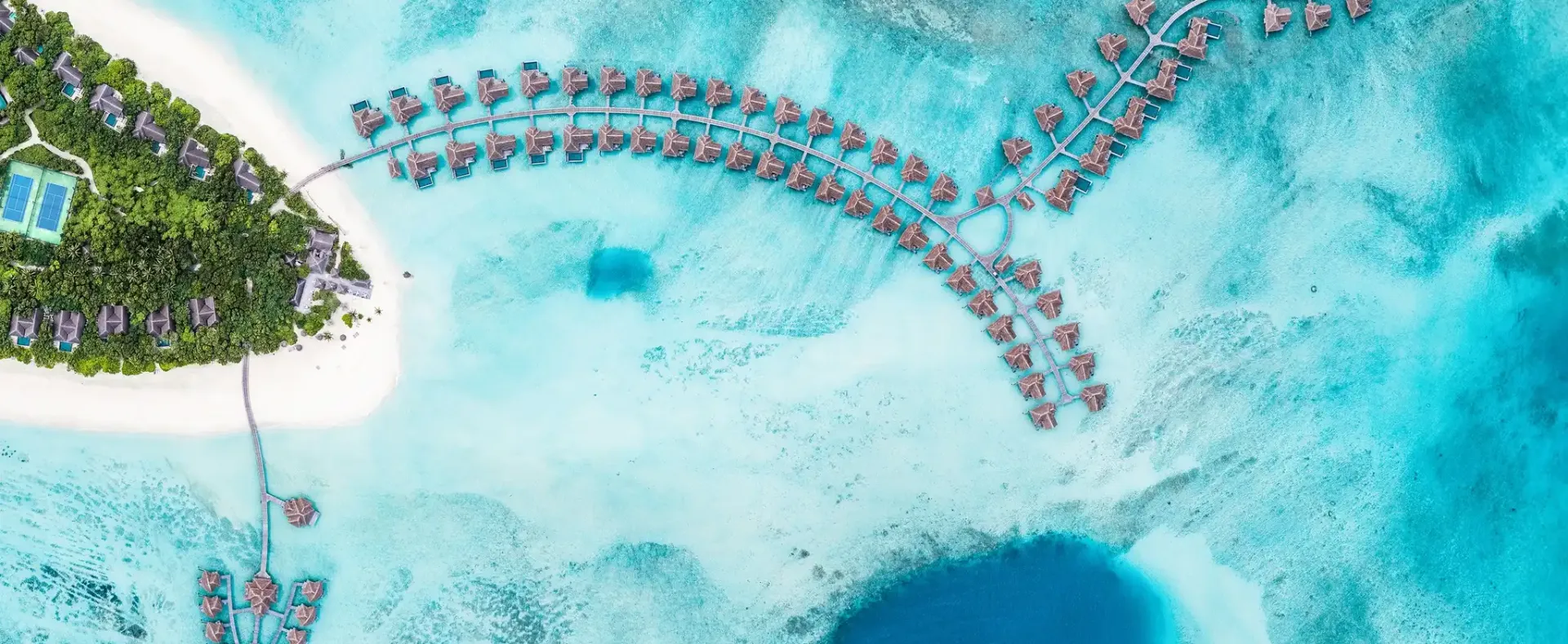 Aerial view of Vakkaru Maldives Residence in a protected biosphere reserve rich in marine life and coral ecosystems