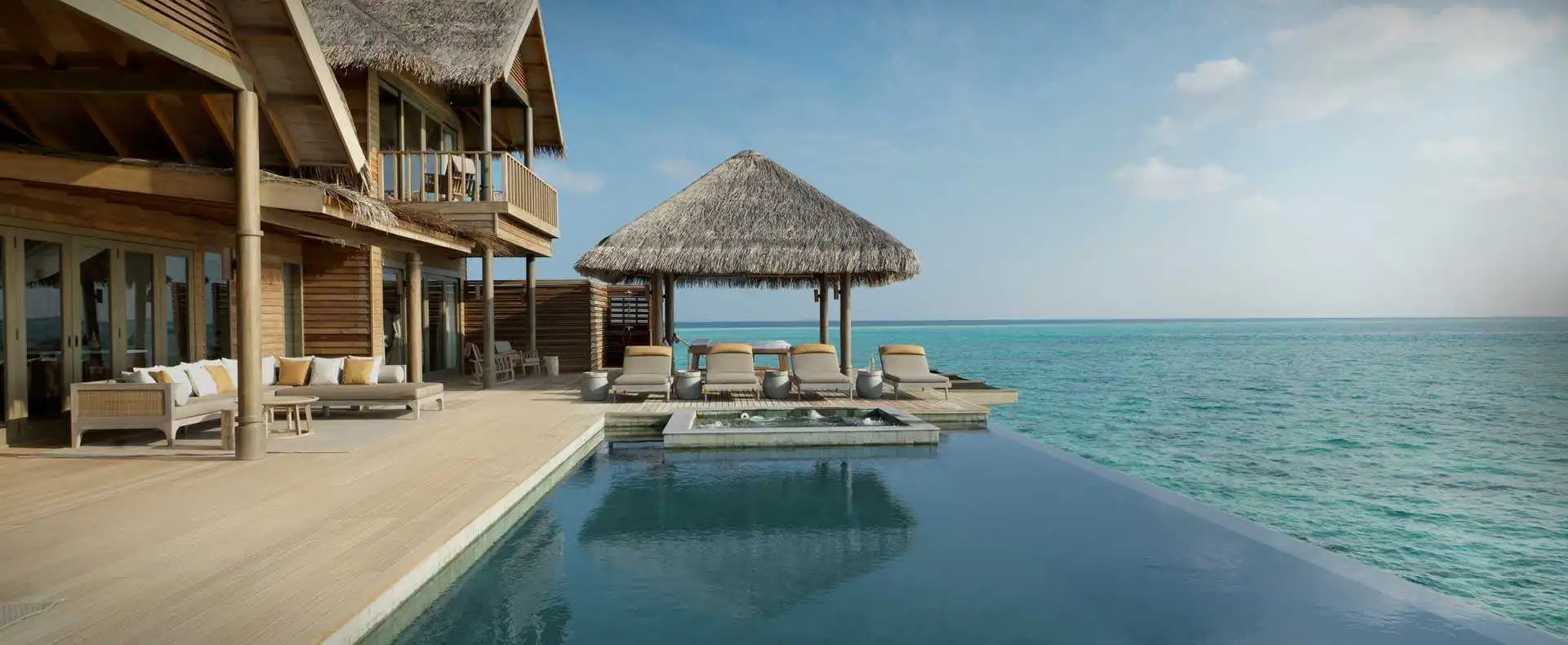 Luxury infinity pool overlooking turquoise waters at Vakkaru Maldives.