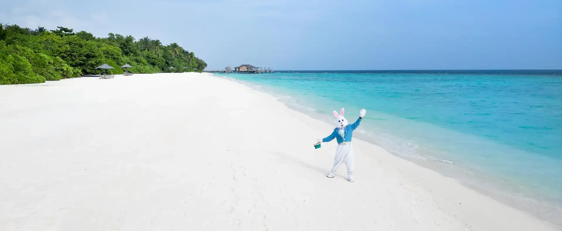 Easter Bunny character on a tropical beach.