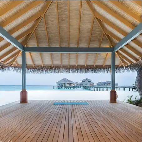 Ocean-facing yoga pavilion at Vakkaru Maldives luxury resort in Baa Atoll