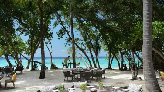 outdoor beach dining area at Amaany Restaurant, Vakkaru Maldives
