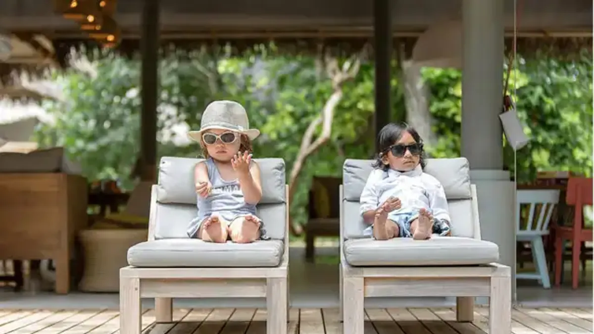 Children enjoying creative activities at Parrotfish Club, Vakkaru Maldives in a fun tropical setting.